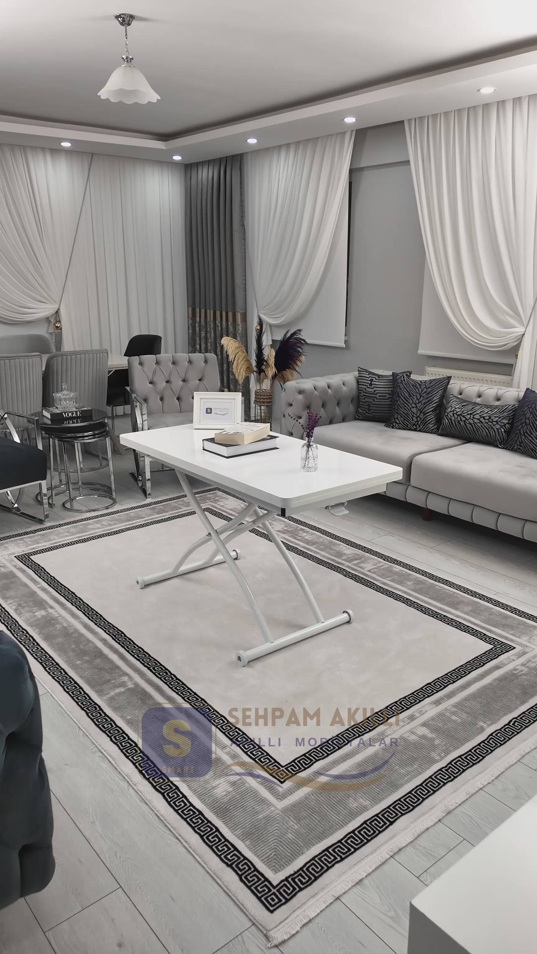 Load video: Juppo Smart Coffee Table – White MDF Top &amp; White Outward-Curving Metal Leg
