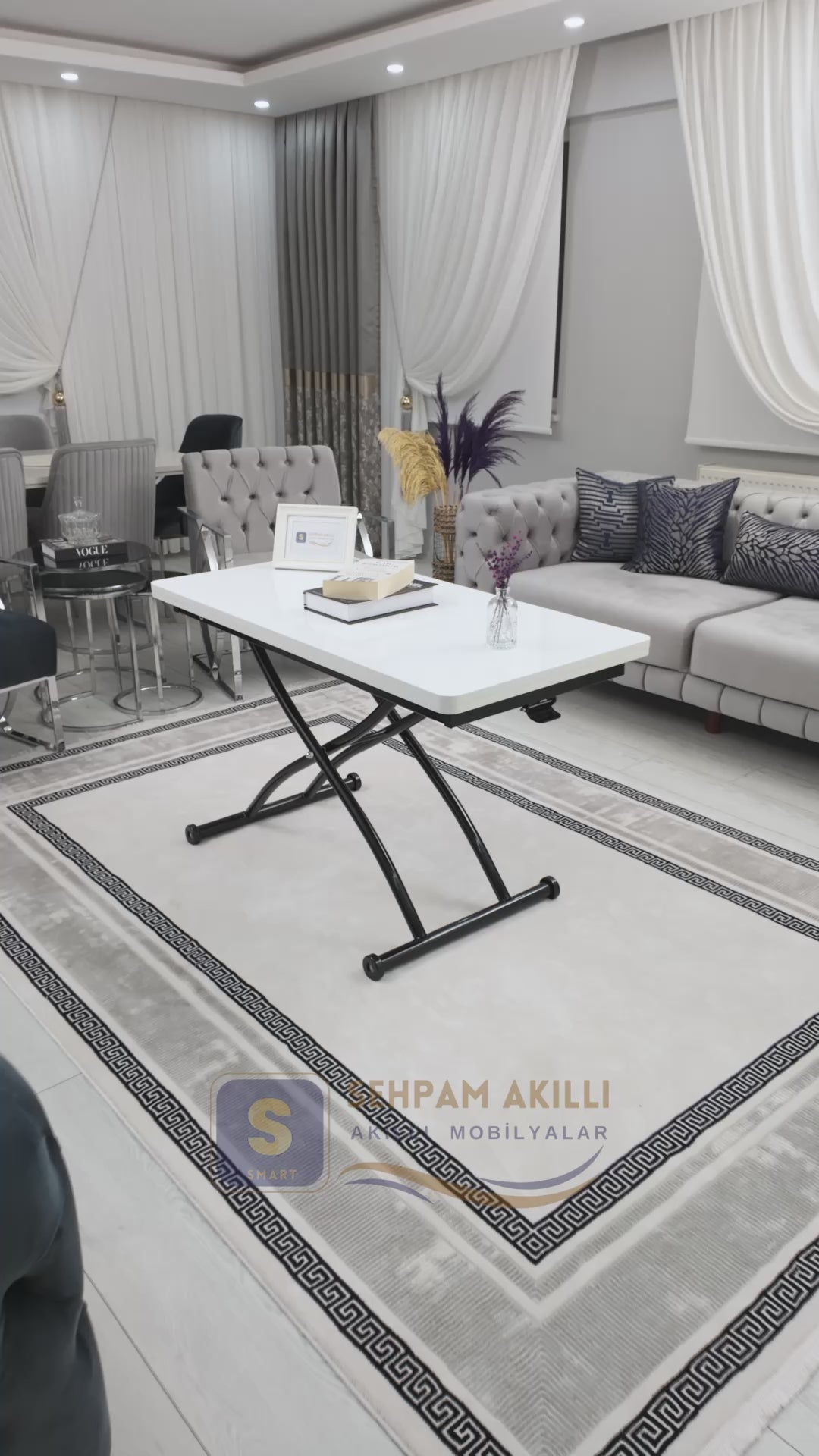 Load video: Juppo Smart Coffee Table – White MDF Top &amp; Black Outward Curved Metal Leg