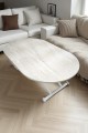 Oval şekilli, ortadan açılabilir akıllı masa. Üst yüzeyi traverten desenli MDF, alt kısmı beyaz renkli modern ayaklarla desteklenmiş şık ve fonksiyonel tasarım.  İstersen daha SEO odaklı ya da farklı stillerde (örneğin minimalist, teknik, kullanıcı odaklı